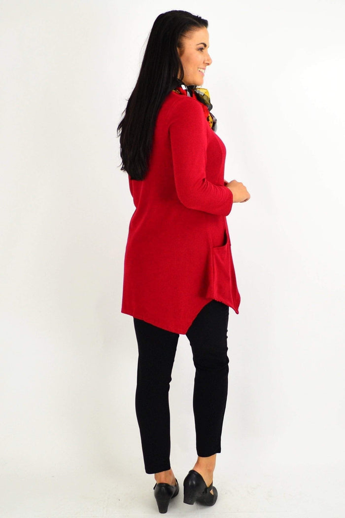 Red rust Peony winter tunic top with pocket detail, long sleeves and a relaxed fit, shown on a model.