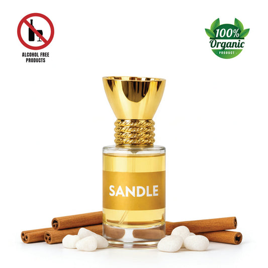 A small glass bottle of amber-colored Sandalwood Attar perfume oil, with a label.