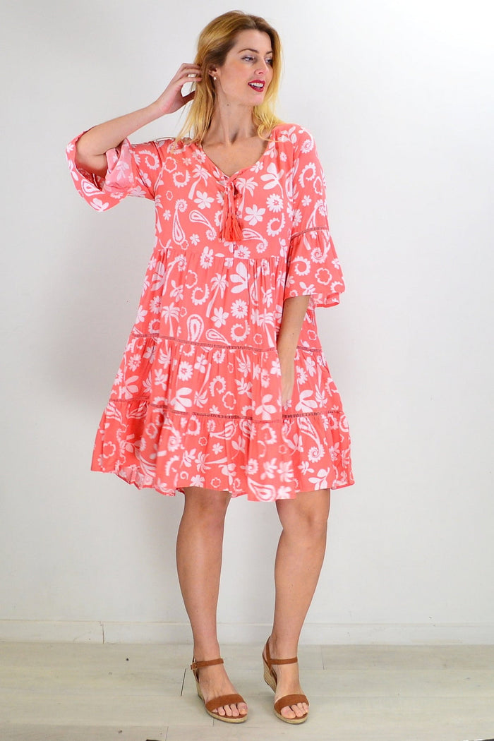 Apricot white bohemian tunic dress from New U Collection with flowing fabric and relaxed fit, displayed on a hanger.