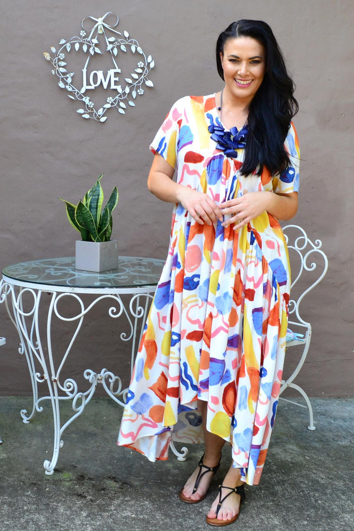 Artist Stock Maxi Tunic Dress by New U Collection, featuring a flowy fabric and artistic print, worn as a stylish casual tunic.