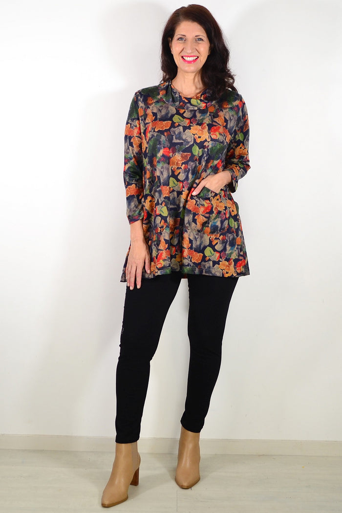 Autumn Leaves Wishstone women's tunic top featuring a leafy print, long sleeves, and a relaxed fit perfect for fall.