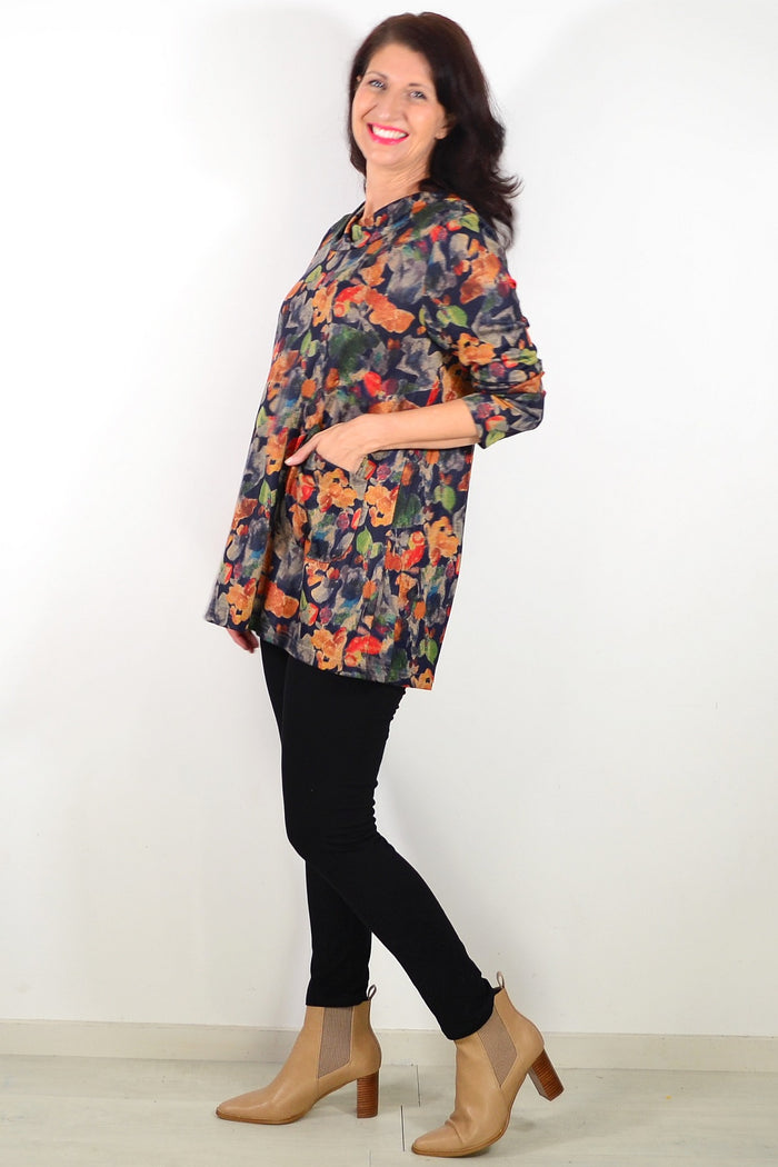 Wishstone Autumn Leaves ladies tunic top with a leaf pattern, featuring a relaxed fit and long sleeves, perfect for fall weather.