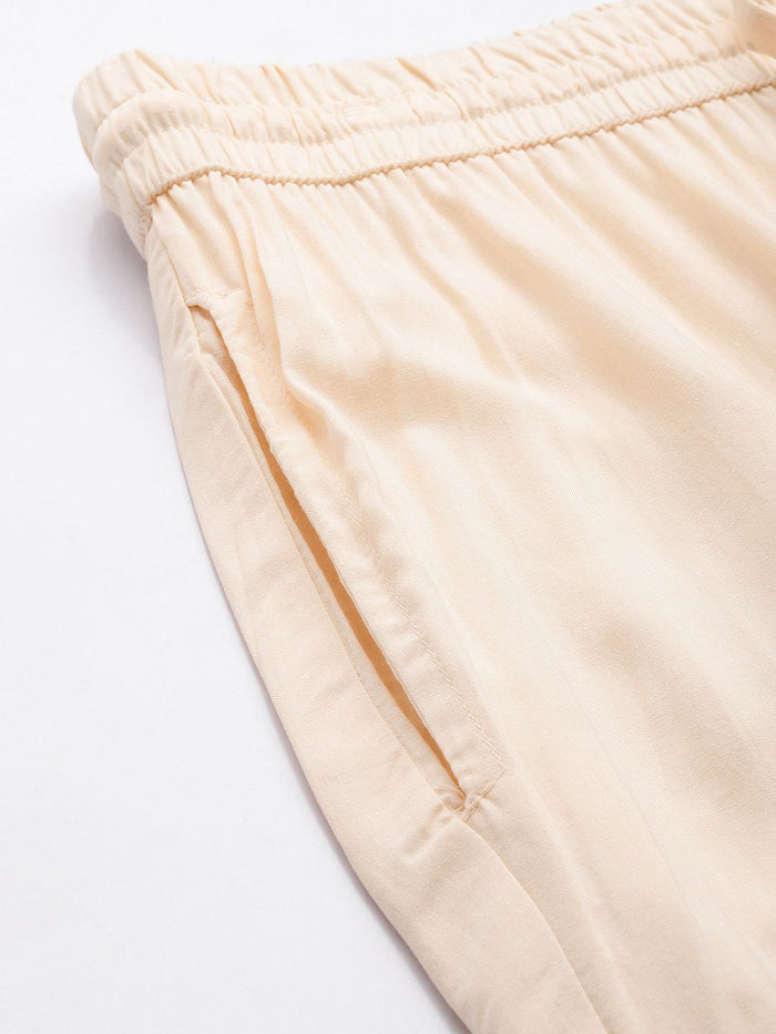 Beige pants worn by a person on a white background, Beige Solid Pencil Pant, Solid pencil Pant, plain pant
