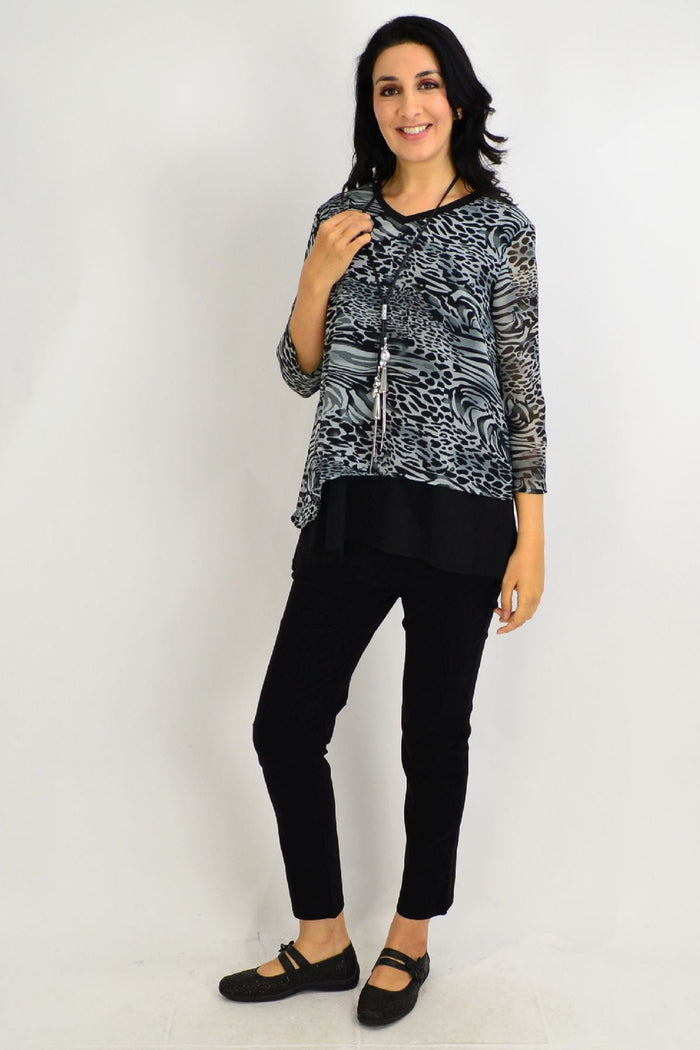 Black Annie animal print tunic top by Stylius, featuring a stylish design with animal pattern and comfortable fit.