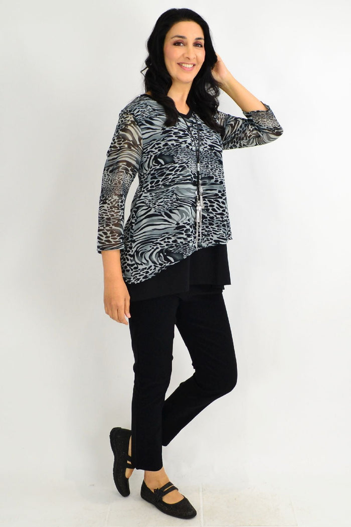 Black Annie animal print tunic top by Stylius featuring a relaxed fit with a bold animal pattern and short sleeves.