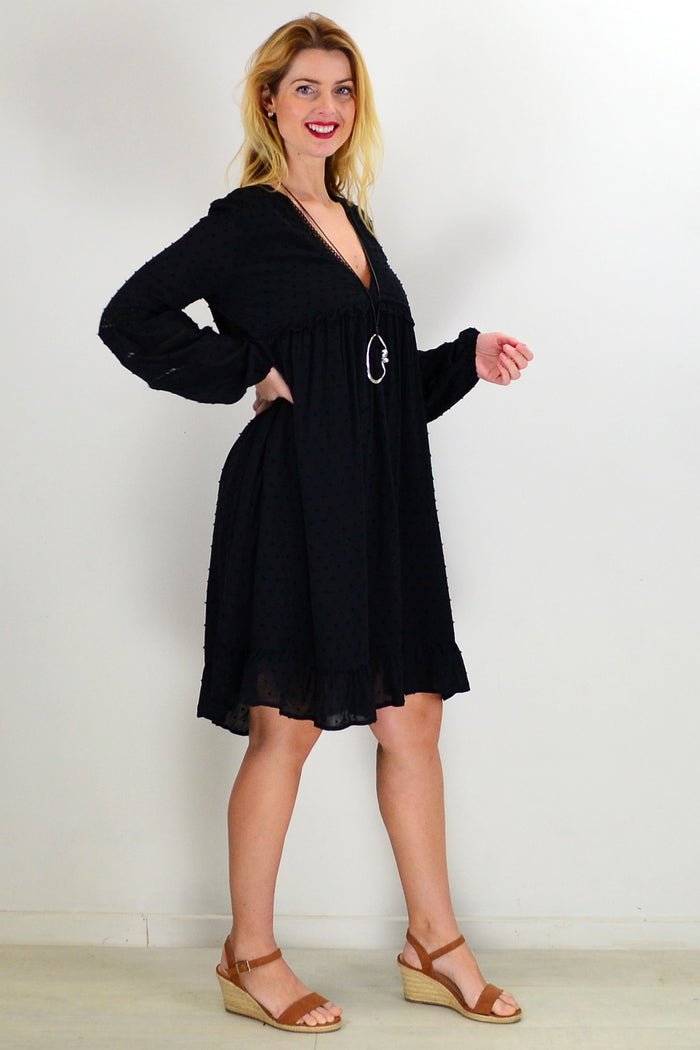 Black bohemian tunic dress from New U Collection with flowing fabric and relaxed fit, styled for casual wear.