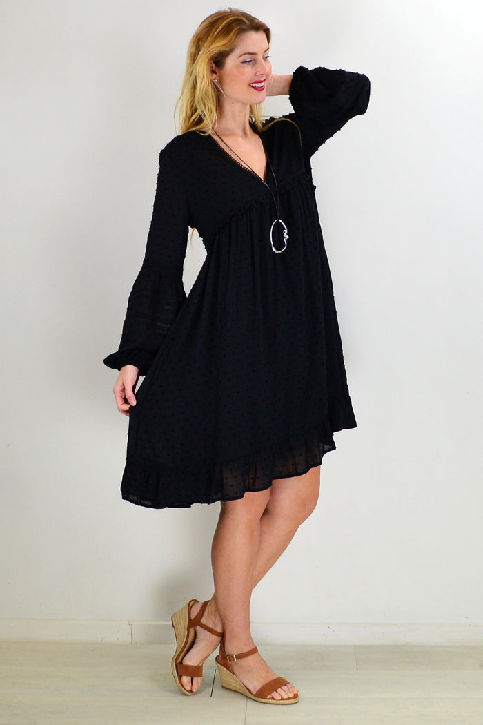 Black Bohemian tunic dress from New U Collection, featuring flowy fabric and relaxed fit, displayed on a model.