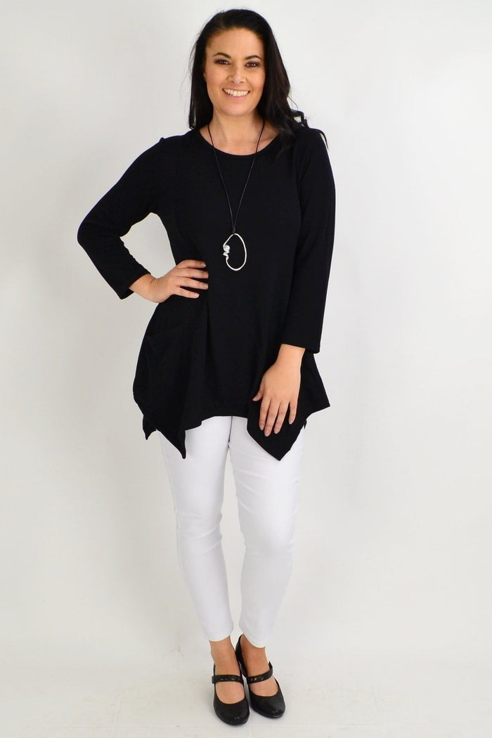 Black pocket winter tunic top by Peony featuring long sleeves and a relaxed fit, ideal for layering in cold weather.