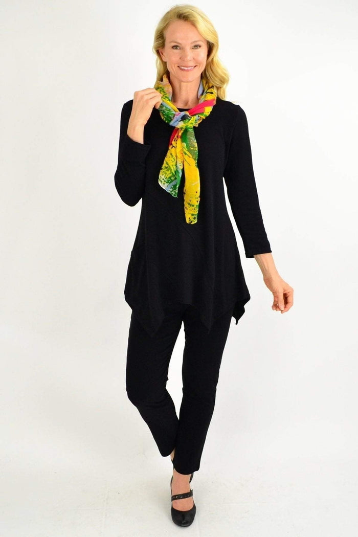 Black Peony winter tunic top with pocket details, long sleeves, and a relaxed fit for casual winter wear.