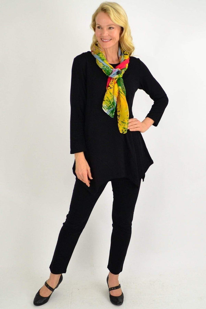 Black Peony winter tunic top with pocket detail, long sleeves, and a relaxed fit, perfect for cold weather.