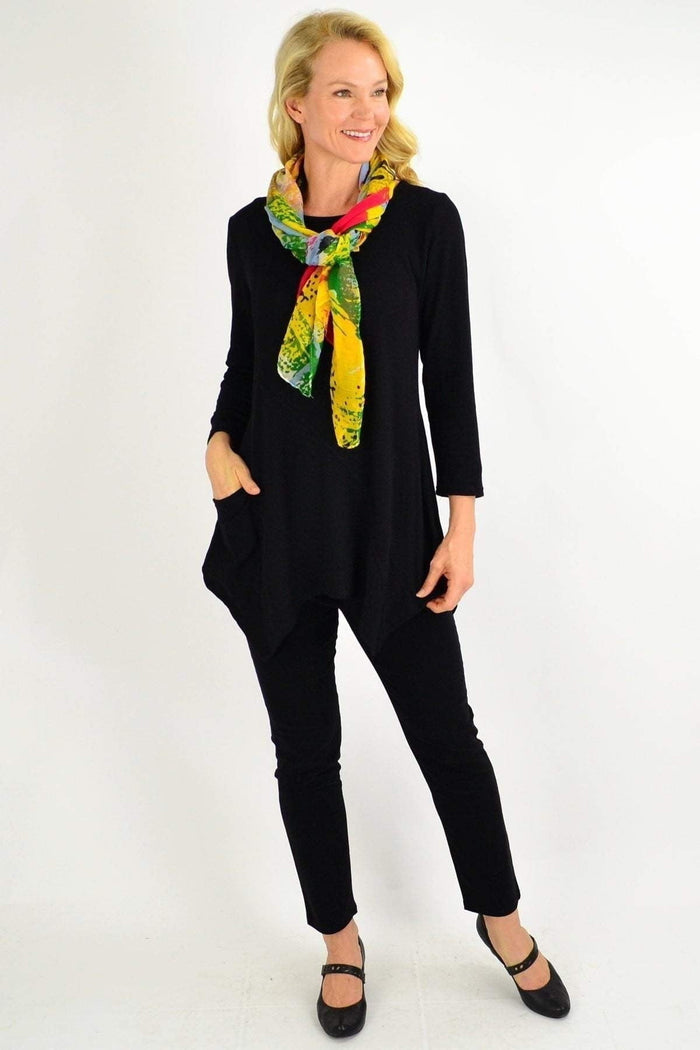Black Peony winter tunic top with pocket detail, long sleeves, and a relaxed fit, ideal for casual winter wear.