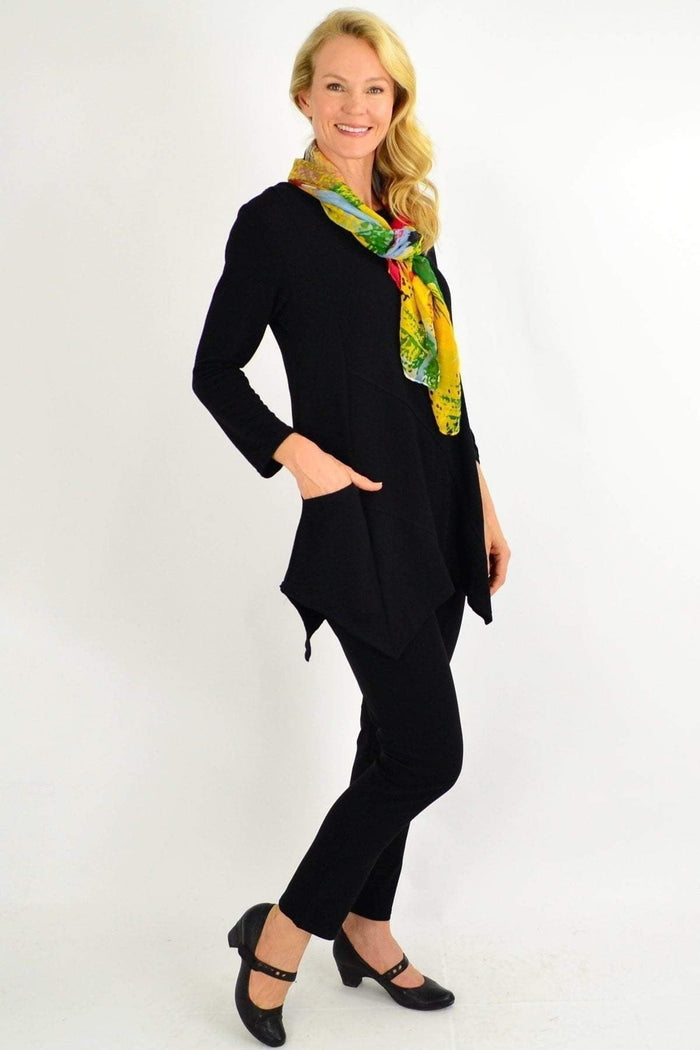 Black Peony winter tunic top with pocket detail, featuring long sleeves and a relaxed fit, perfect for chilly weather.