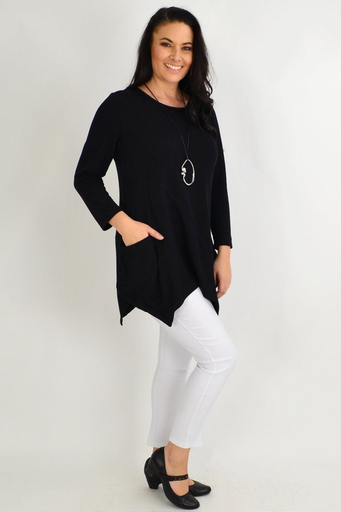 Black Peony winter tunic top with pocket detail, long sleeves, and a relaxed fit, perfect for casual cold-weather wear.