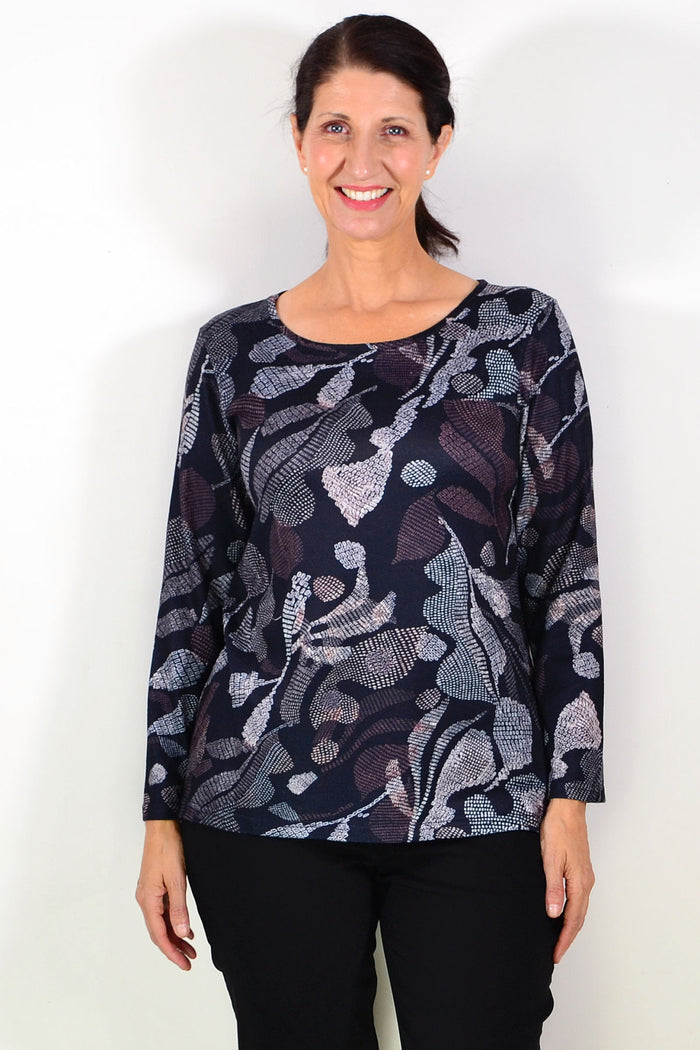 Black printed winter tunic top from Hourglass featuring a stylish pattern and comfortable fit, ideal for cold weather wear.