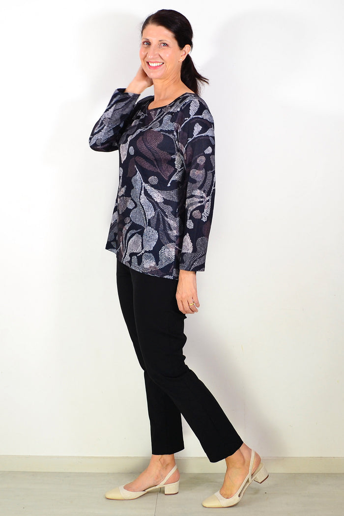 Black printed winter tunic top by Hourglass featuring a stylish pattern and comfortable fit, perfect for cold-weather casual wear.