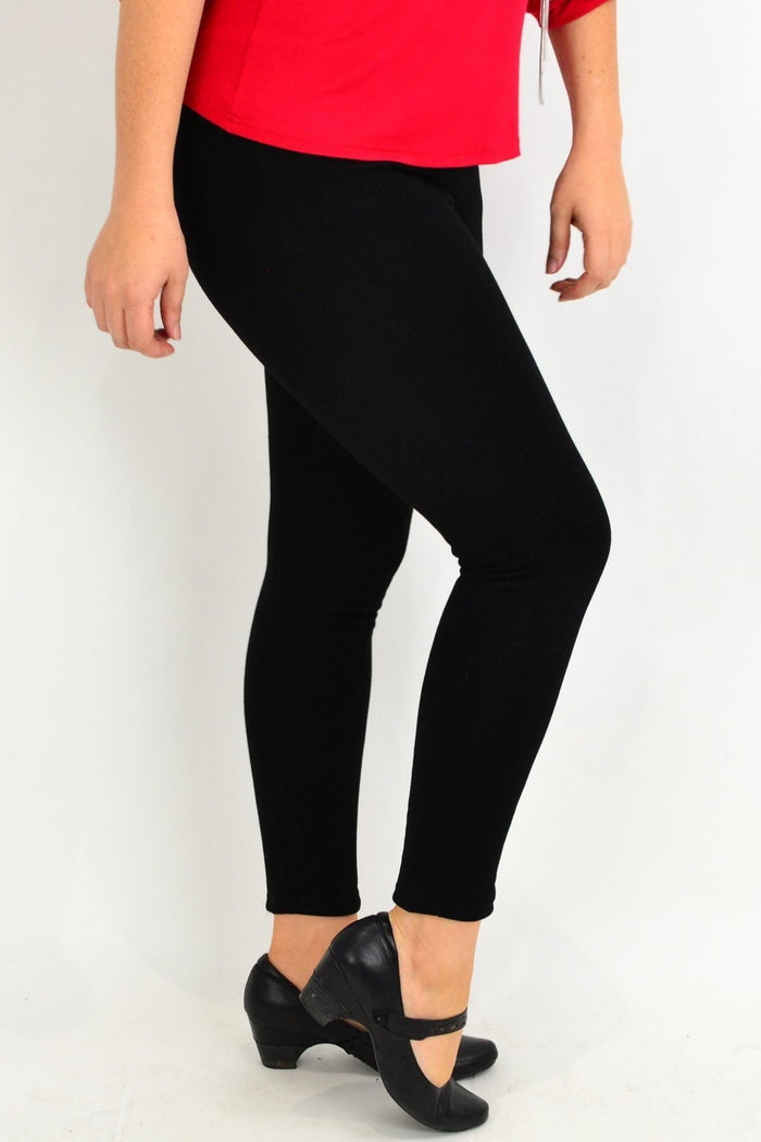 Black Whispers winter fleece-lined leggings shown, highlighting their cozy, warm fleece interior and snug fit for cold weather.