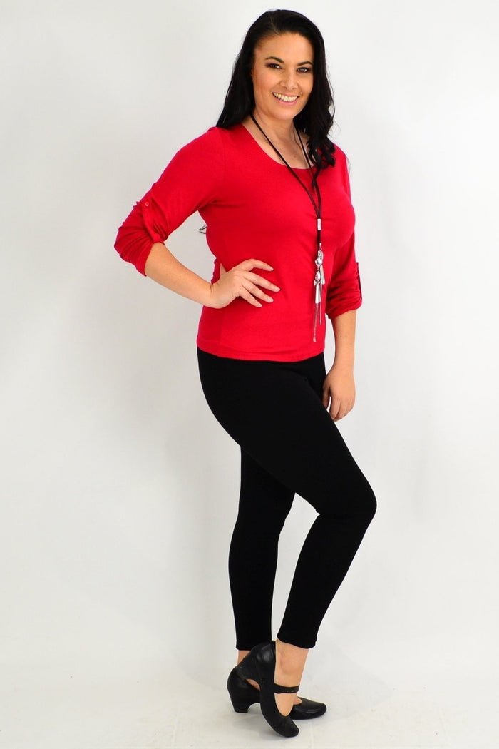 Black winter fleece-lined leggings by Whispers, showing close-up of soft fleece interior and fitted black leggings design.