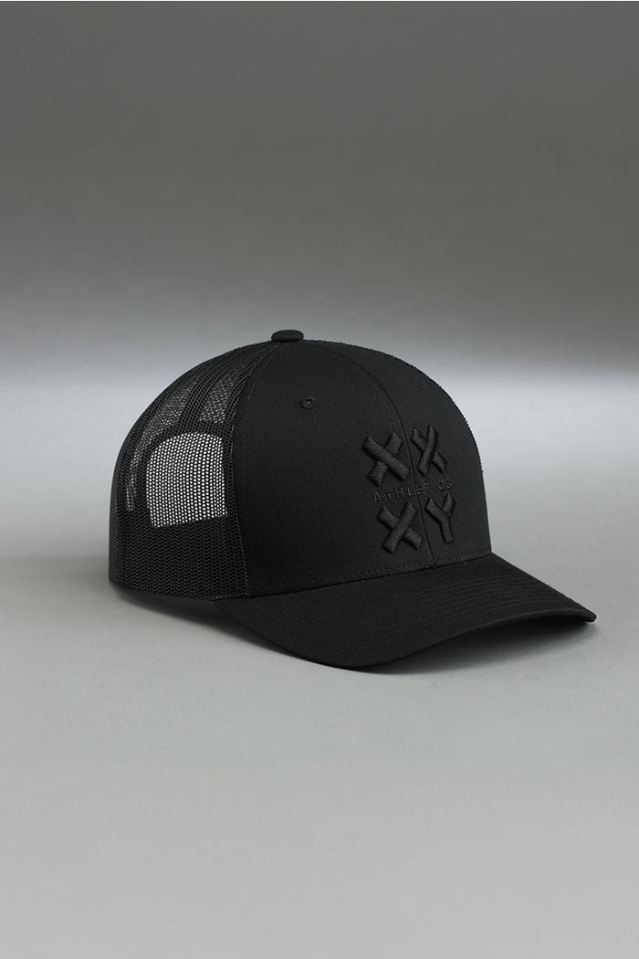 Black cap with a logo on a gray background || black with black logo