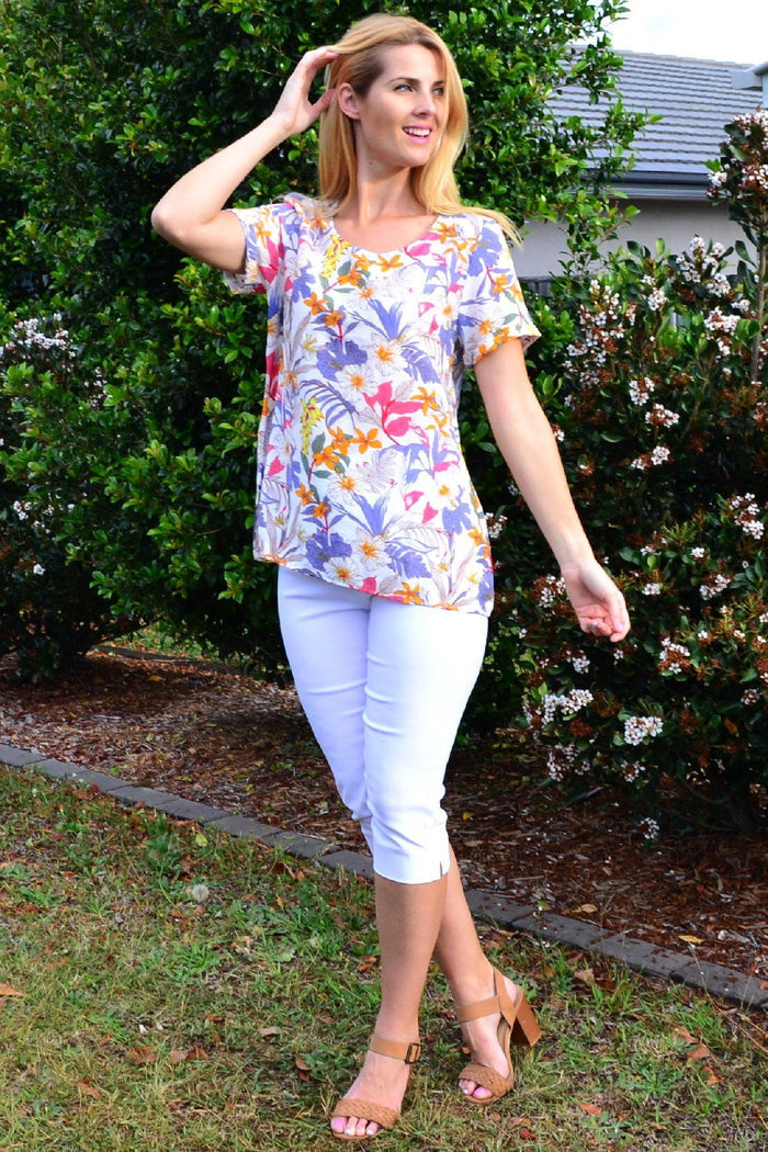 Stylus Botanical Garden Tunic Blouse featuring vibrant floral patterns and lightweight fabric, perfect for casual or garden wear.