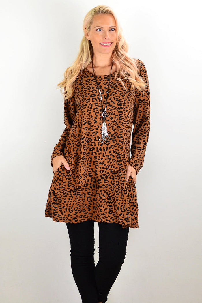Brown animal print tunic top by Hourglass, featuring a relaxed fit and stylish animal pattern, shown in the product image.