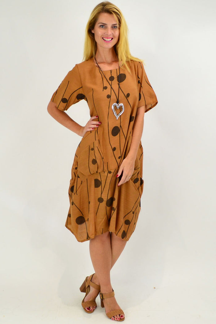 La Mode caramel dots bubble tunic dress, lightweight and stylish with a relaxed fit, showcased on a model.