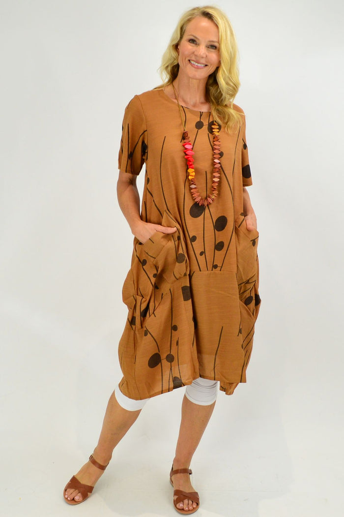 Brown Caramel Dots Bubble Tunic Dress by La Mode featuring a loose fit and playful dot pattern.
