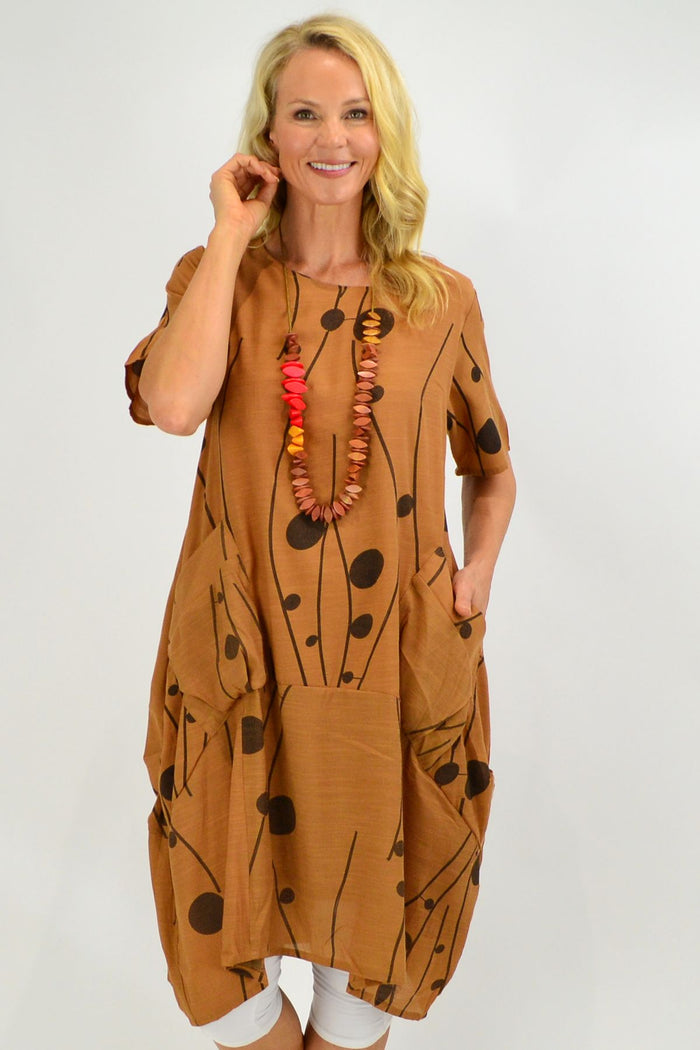 Caramel Dots Bubble Tunic Dress by La Mode, featuring a playful dotted pattern and a relaxed, bubble silhouette.