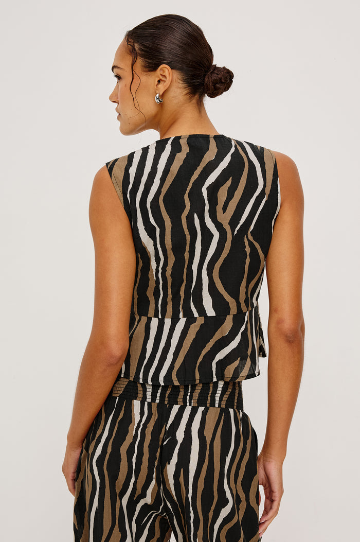 Chala Cropped Sleeveless Top in Beach Cotton With Deep V-Neckline With Adjustable Self-Ties in Canyon Stripe Colorway - Upper Body Back View Featured on Model