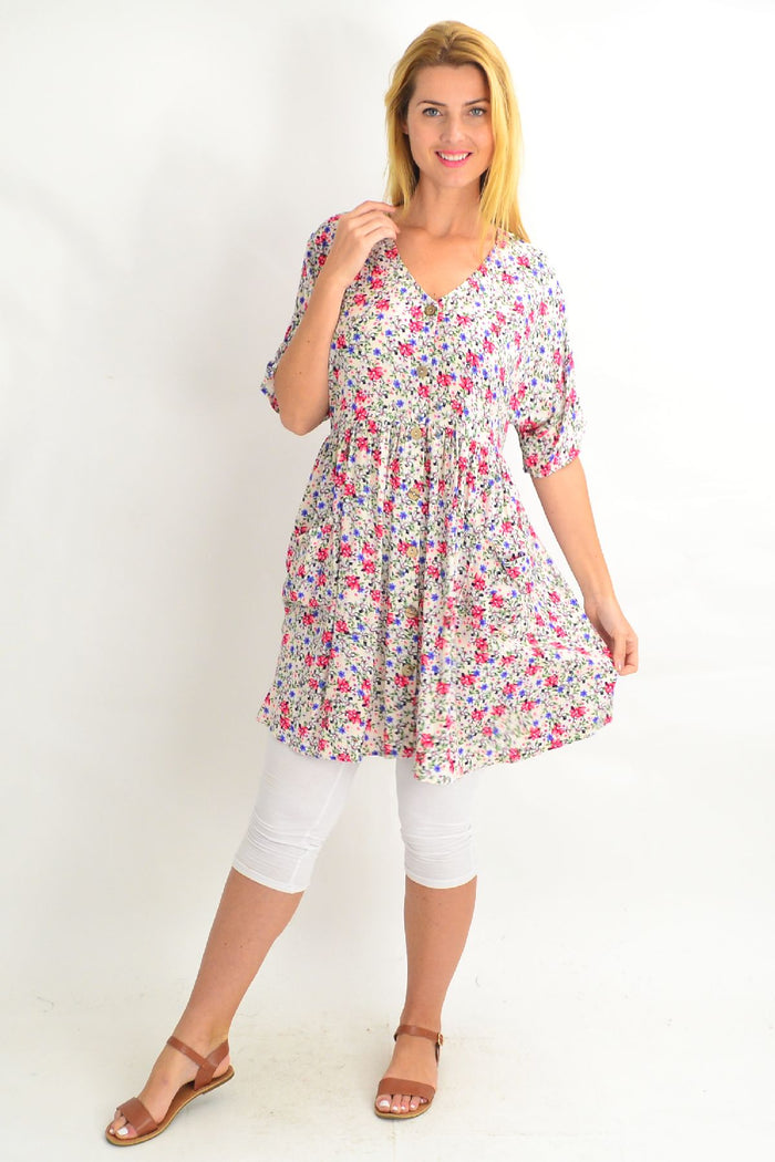 Cream coconut button pocket tunic dress by Silver Wishes featuring a relaxed fit and stylish front pockets.