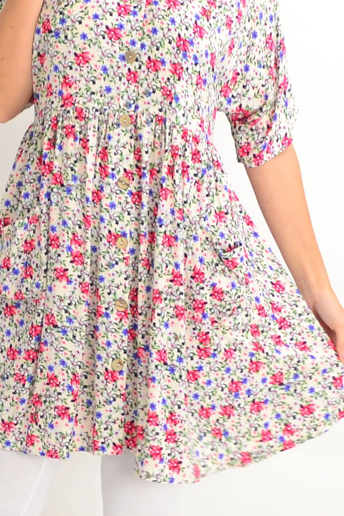 Cream coconut button pocket tunic dress by Silver Wishes, featuring a relaxed fit, front pockets, and a casual style.