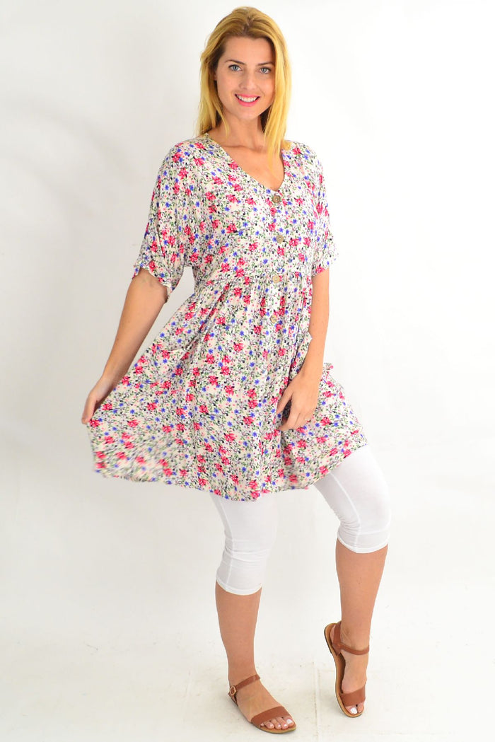 Cream coconut button pocket tunic dress by Silver Wishes, featuring a relaxed fit with pocket details and a stylish neckline.