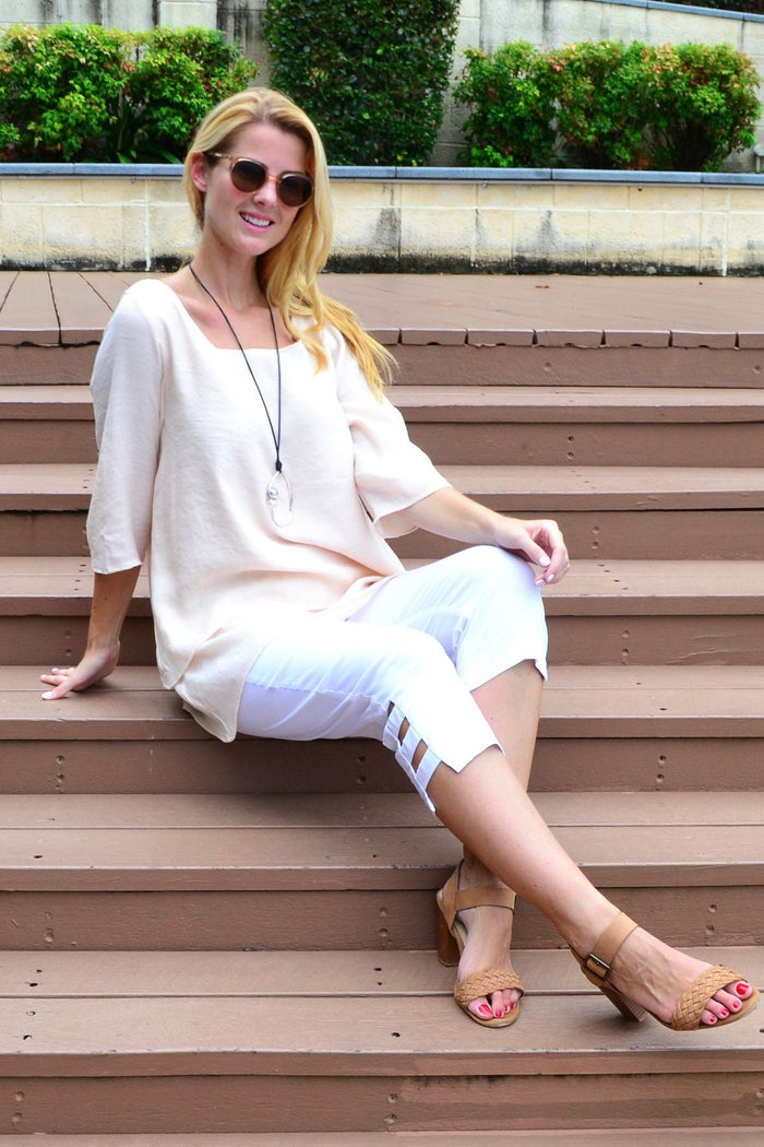 Cream layered tunic blouse by La Mode featuring a relaxed fit, long sleeves, and stylish design perfect for weekend wear.