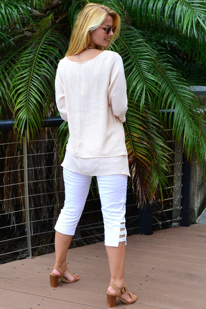 Cream layered tunic blouse from La Mode featuring a relaxed, easy weekend style with long sleeves and a flowy silhouette.