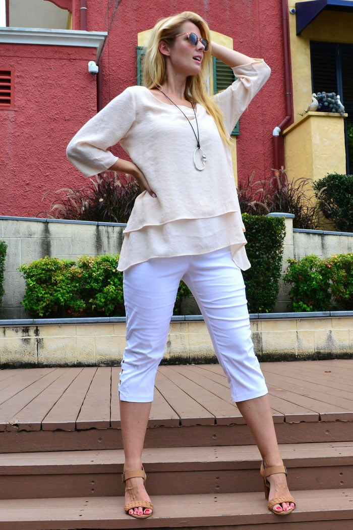 Cream layered weekend tunic blouse by La Mode, featuring a relaxed fit with short sleeves and a stylish, layered design.