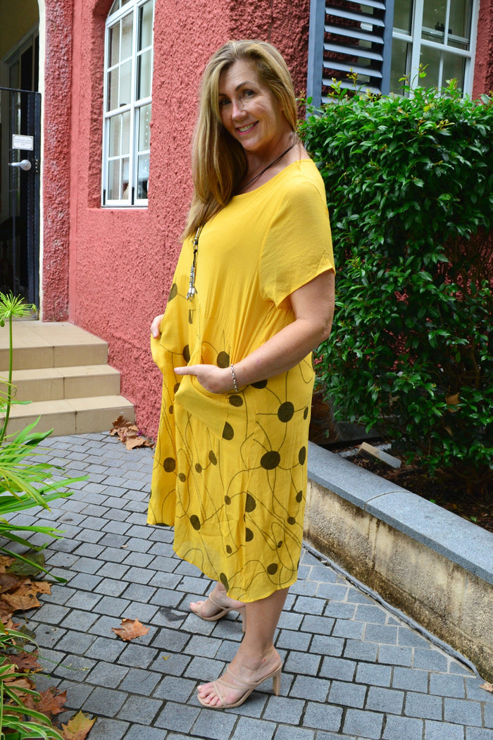 Wishstone Dotty Yellow Pocket Dress tunic with short sleeves and front pockets, casual and vibrant for warm-weather wear.