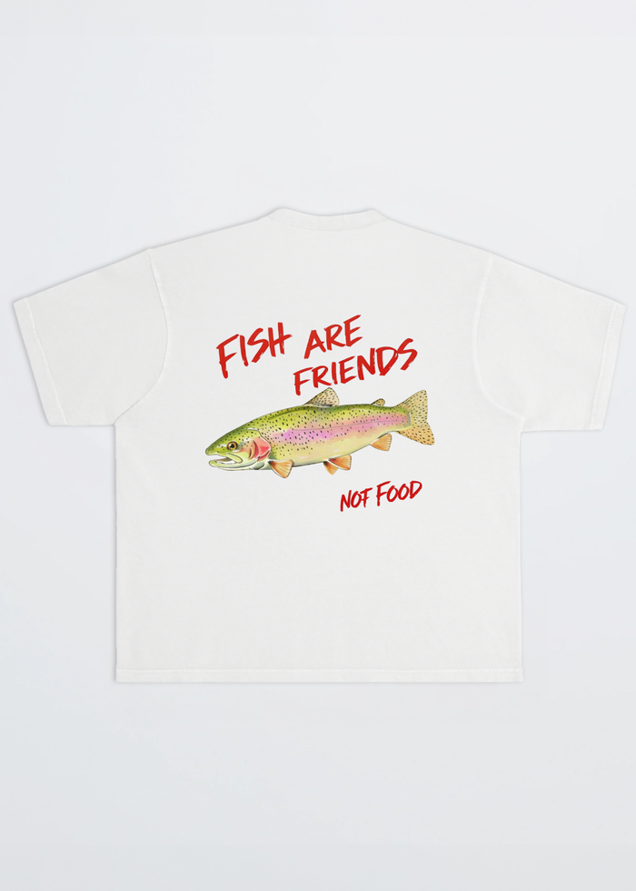 White t-shirt with a fish graphic and text 'Fish are friends, not food' on a white background