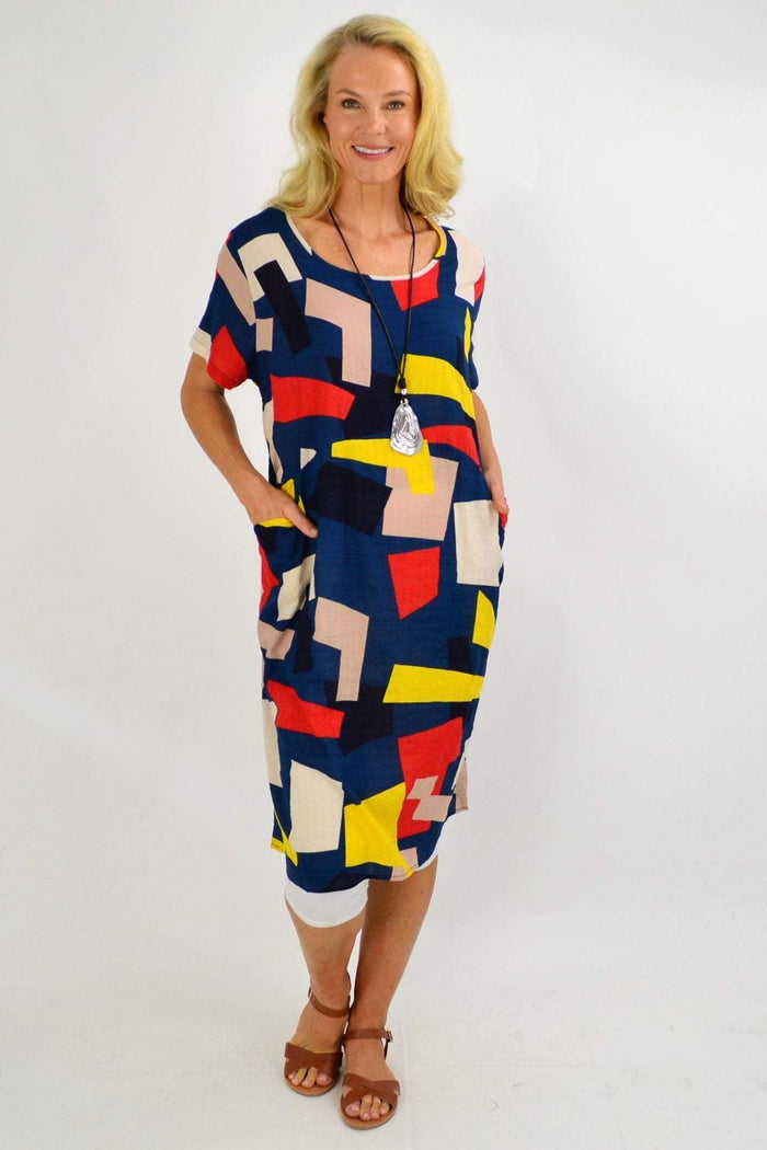 Blue and yellow geometric shape tunic dress by Wishstone, featuring a long, flowing design with vibrant patterns.