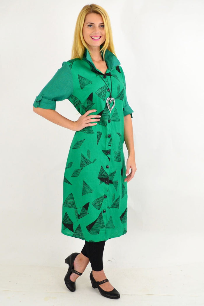 Green and black abstract tunic dress by Ruby Rain featuring a stylish, relaxed fit with long sleeves and a contemporary design.