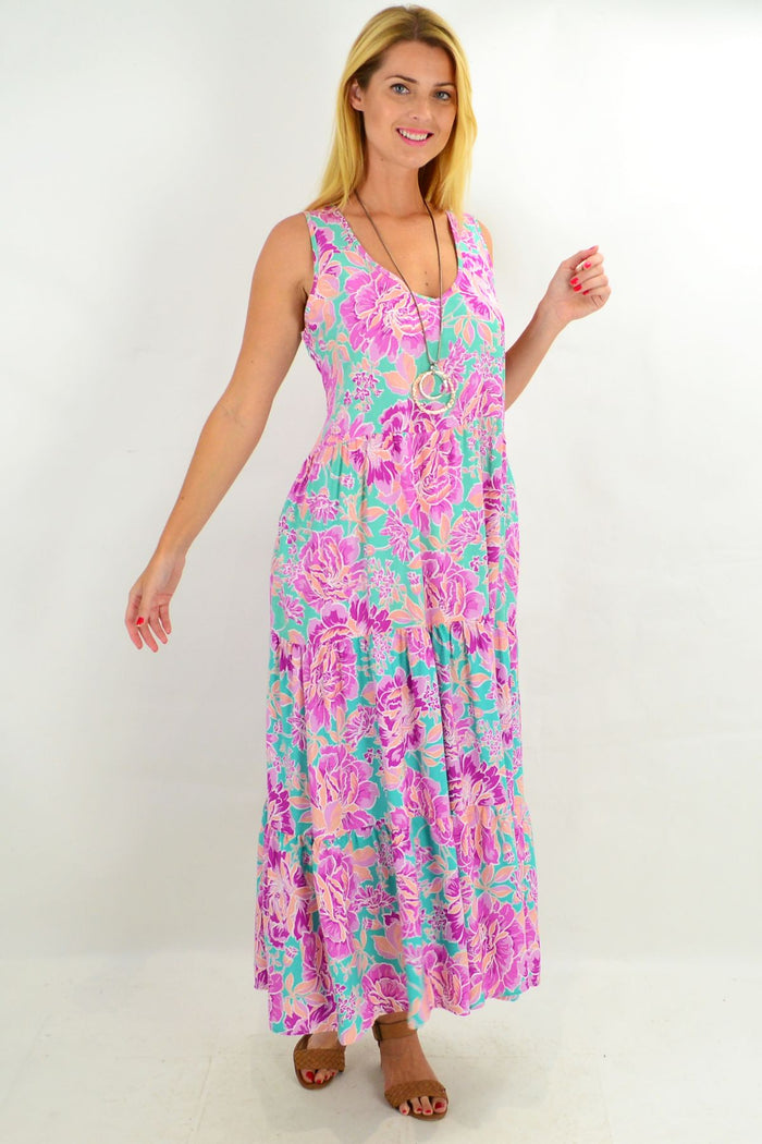 Hibiscus print long tunic maxi dress from New U Collection with tiered design and flowing fabric, perfect for casual wear.