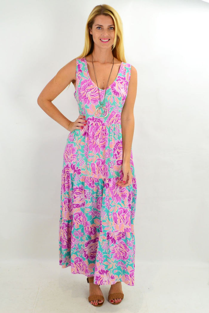 Hibiscus tiered long tunic maxi dress by New U Collection featuring vibrant floral print and flowing fabric.