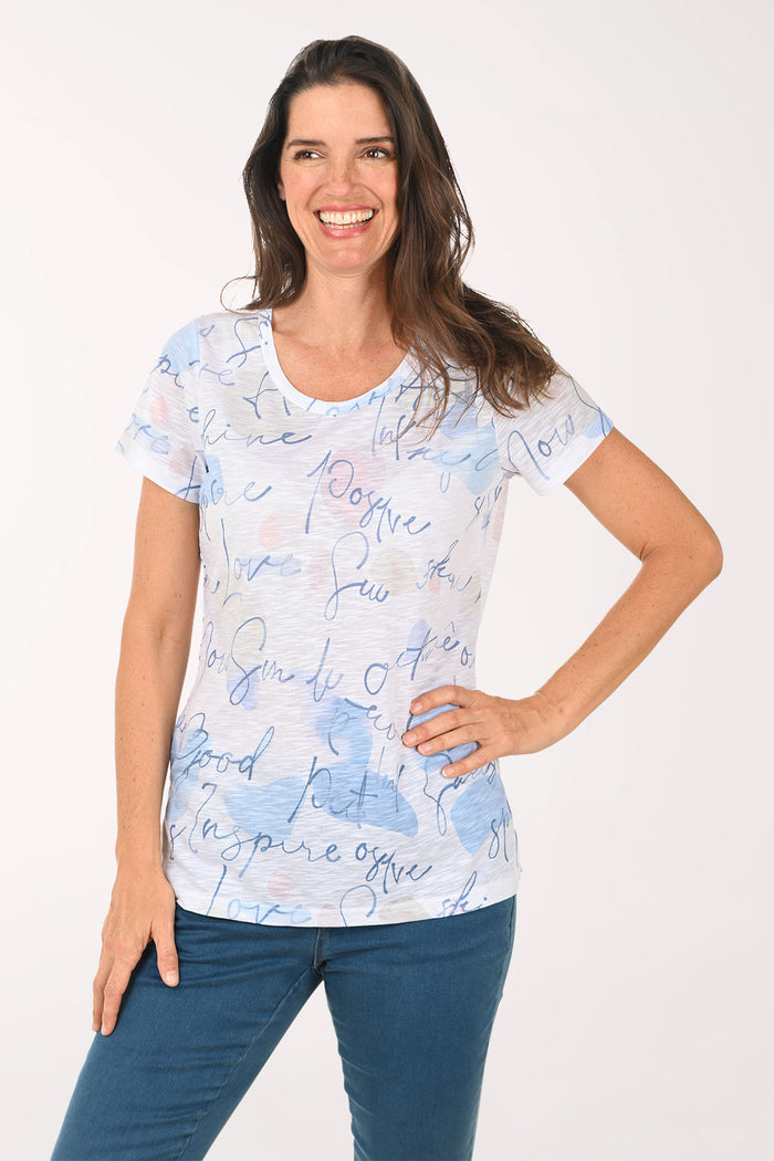 Woman wearing a short sleeve white top