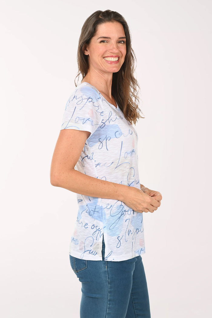 Woman wearing a short sleeve white top