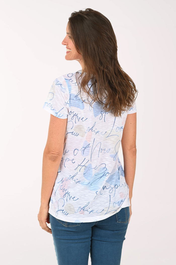 Woman wearing a short sleeve white top