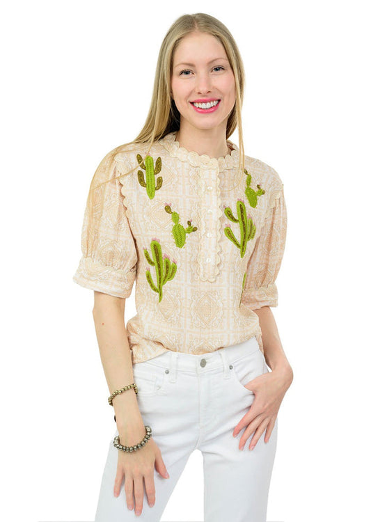 cream short sleeve top with cactus