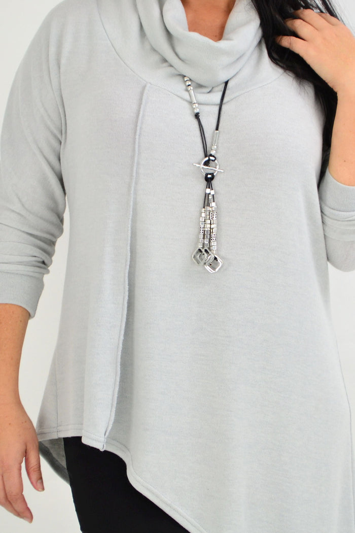 Light grey asymmetrical rolled neck jumper tunic by Four Girlz, stylish and cozy Australian-made women's fashion piece.
