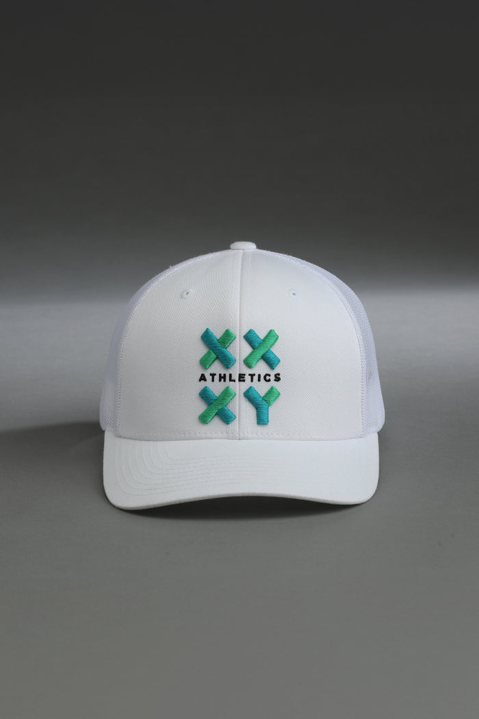 White cap with green and black logo on a gray background || white with color logo