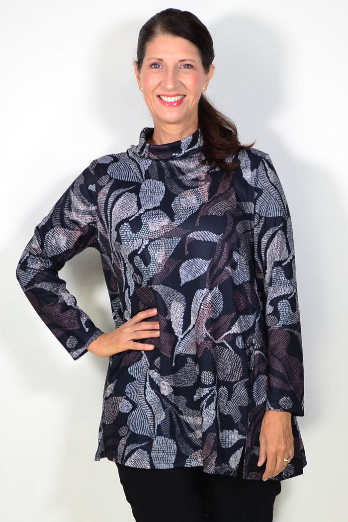 Long black printed winter tunic top by Hourglass, featuring a relaxed fit and stylish design, suitable for cold weather wear.