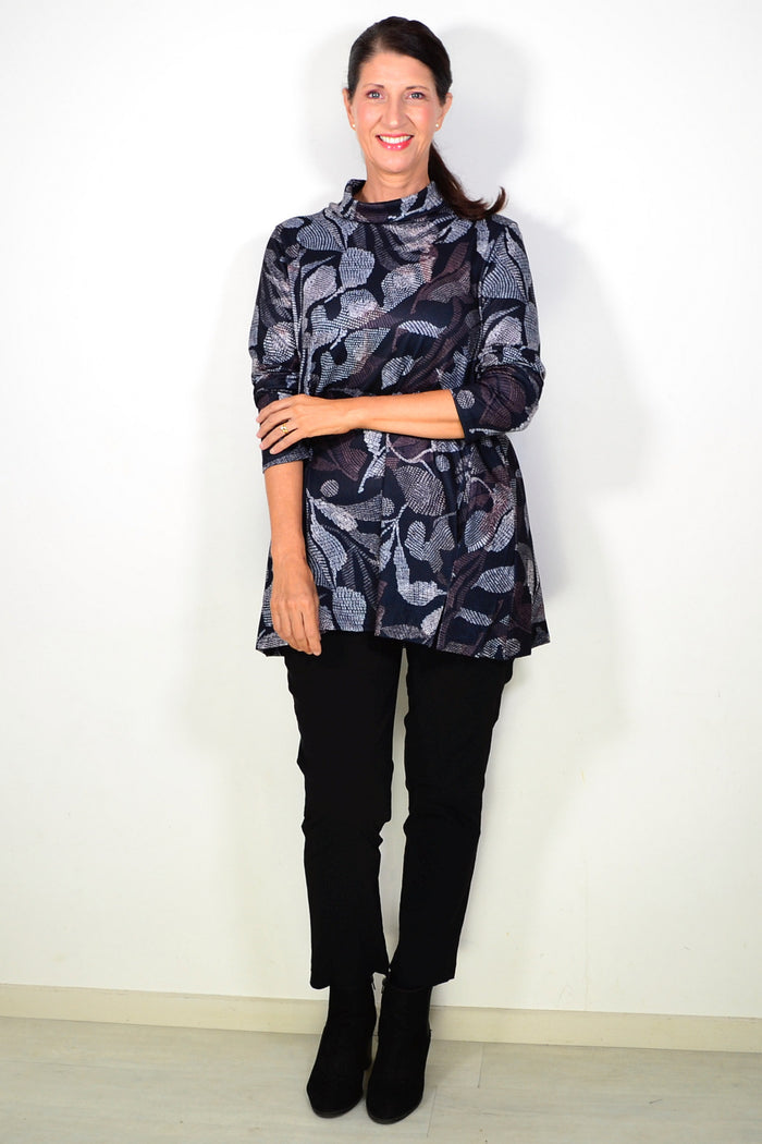 Long black printed winter tunic top by Hourglass, featuring a comfortable fit and stylish design with intricate print details.