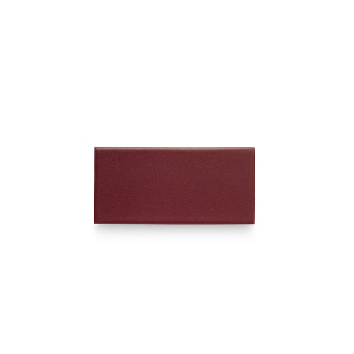 One Heath Ceramics ceramic tiles glazed in Cranberry, a matte saturated burgundy-red glaze
