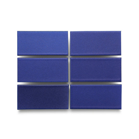 Six Heath Ceramics ceramic tiles glazed in Ultramarine, a vivid matte blue glaze